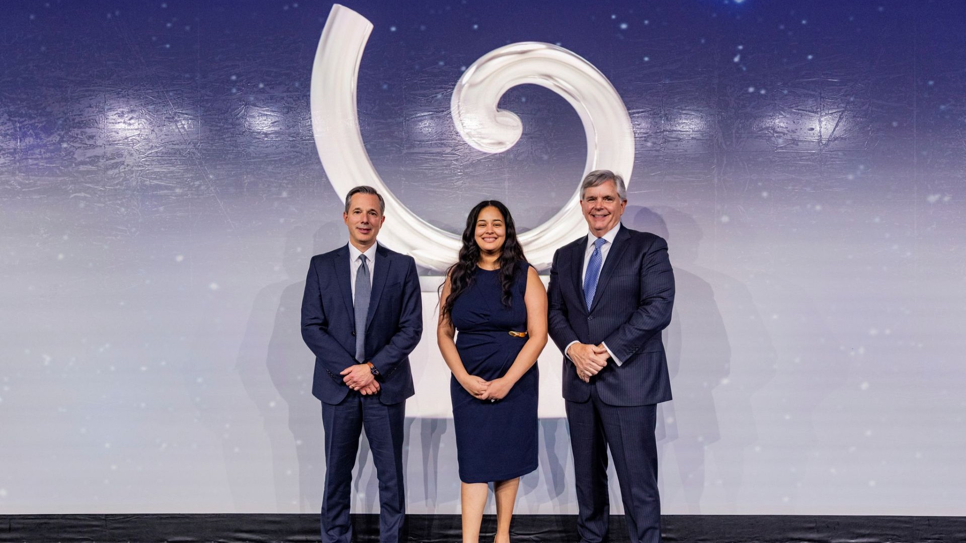 Amber Beebe at the 2026 GE Aerospace Altitude Awards with Chief Human Resources Officer Christian Meisner and Chairman and CEO Larry Culp.