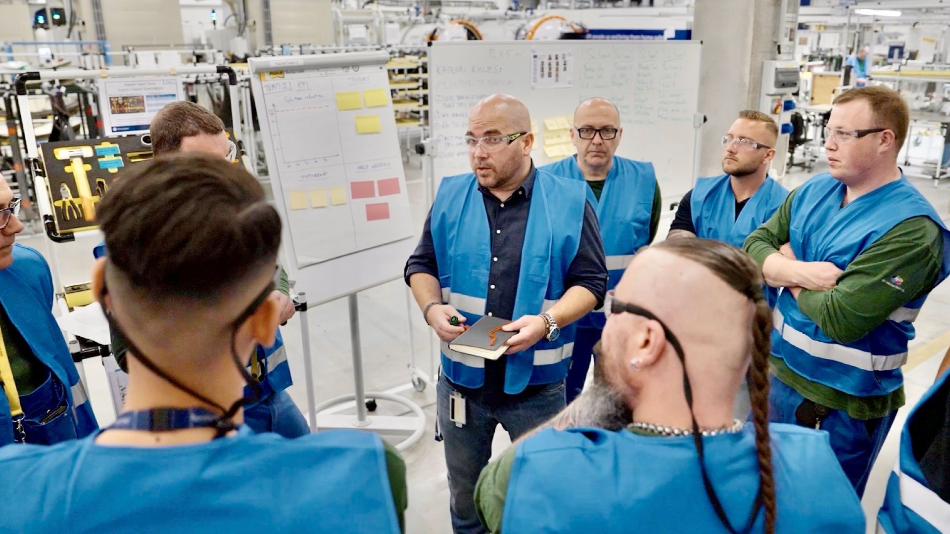 Employees at GE Aerospace's component repair facility in Budapest, Hungary, take part in a shingijutsu kaizen event in 2025.