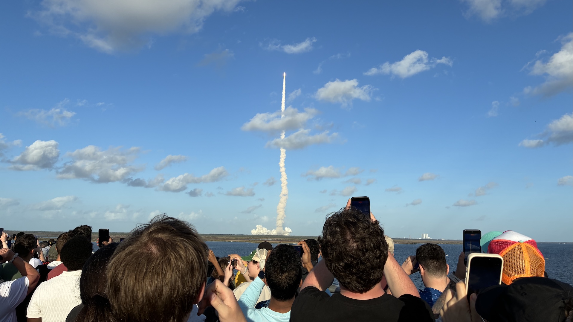 Crowd watching launch of NASA's Artemis II at Kennedy Space Center