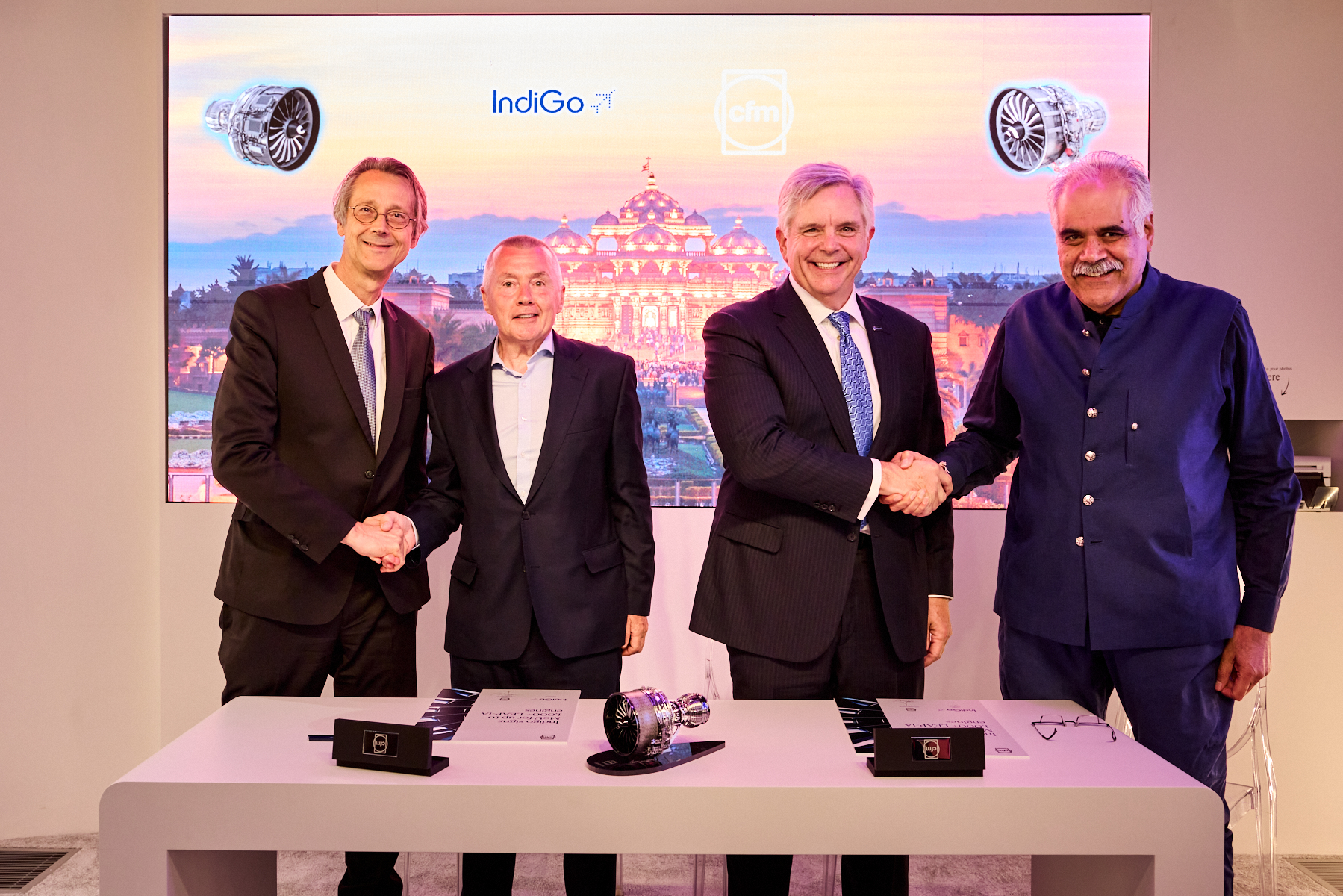 Photo of signing agreement
