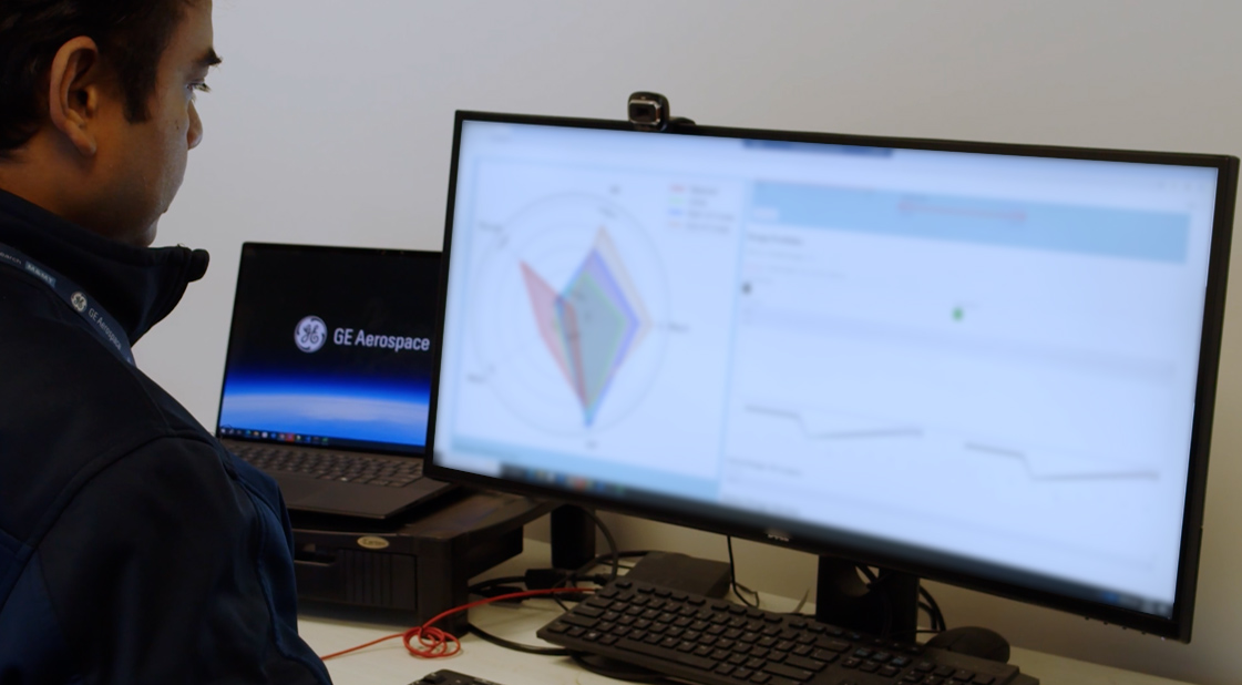 A GE Aerospace researcher works through the user interface of their in-house...