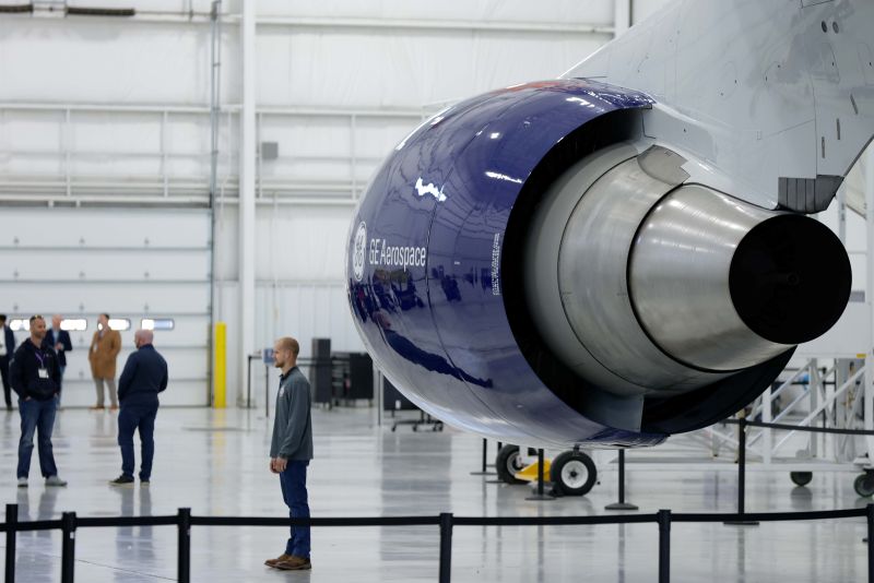 closeup from behind of engine on wing, pylon in view