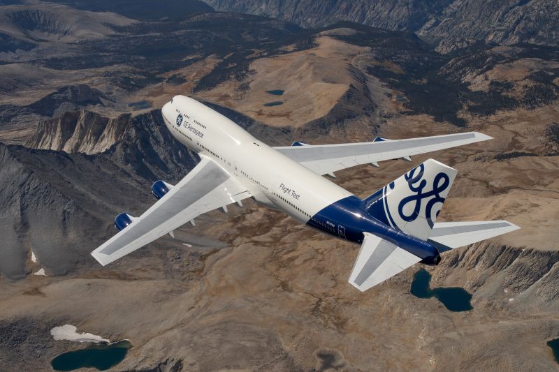 FTB in flight, desert mountain range below