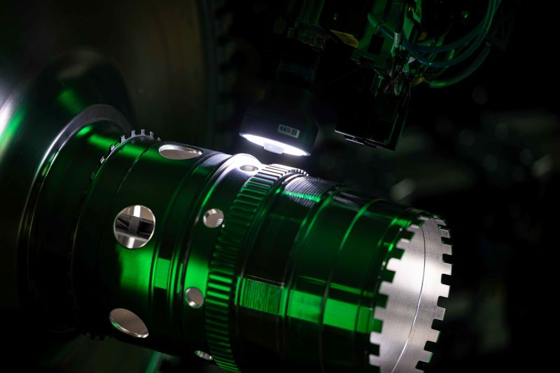Machinery with green light shining on it