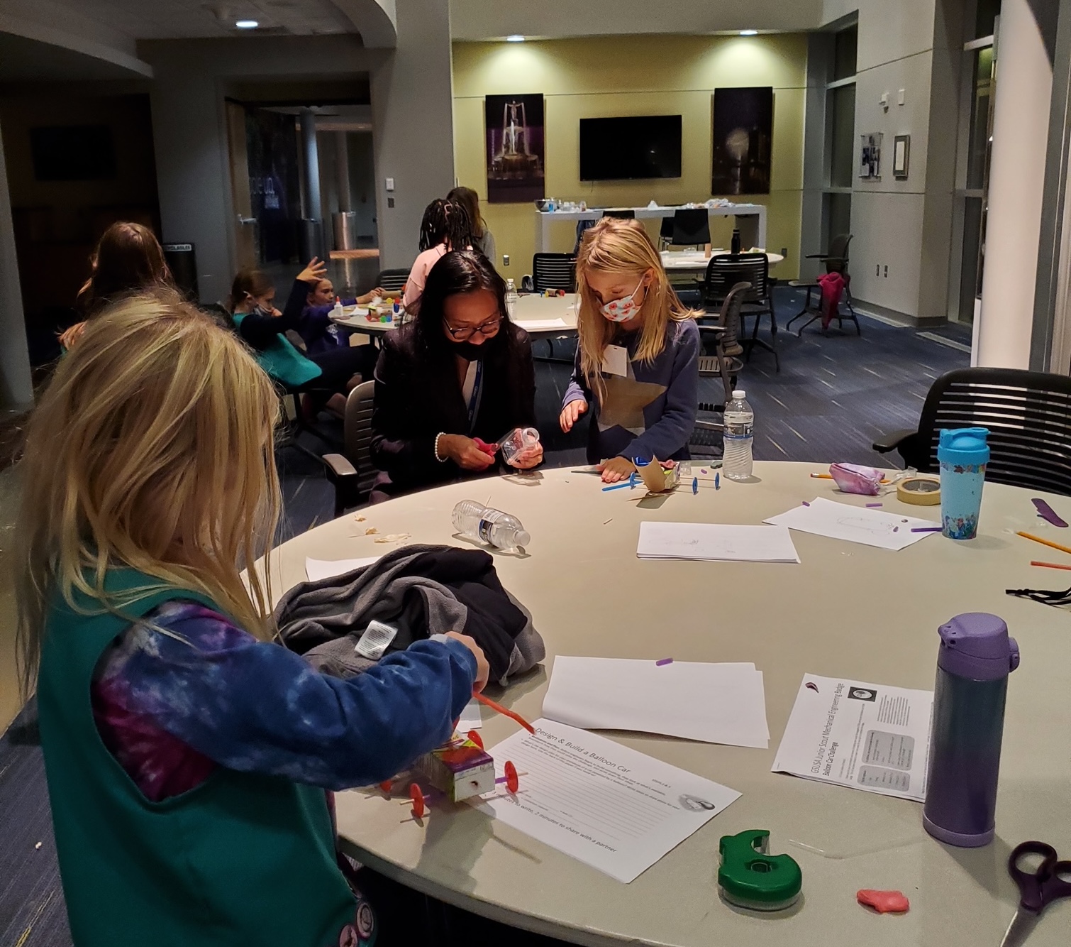 Moo Young volunteering at a Girl Scouts event.