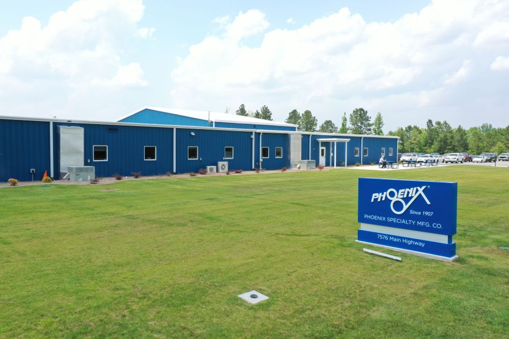 A low, long blue building with a sign reading "Phoenix" in front