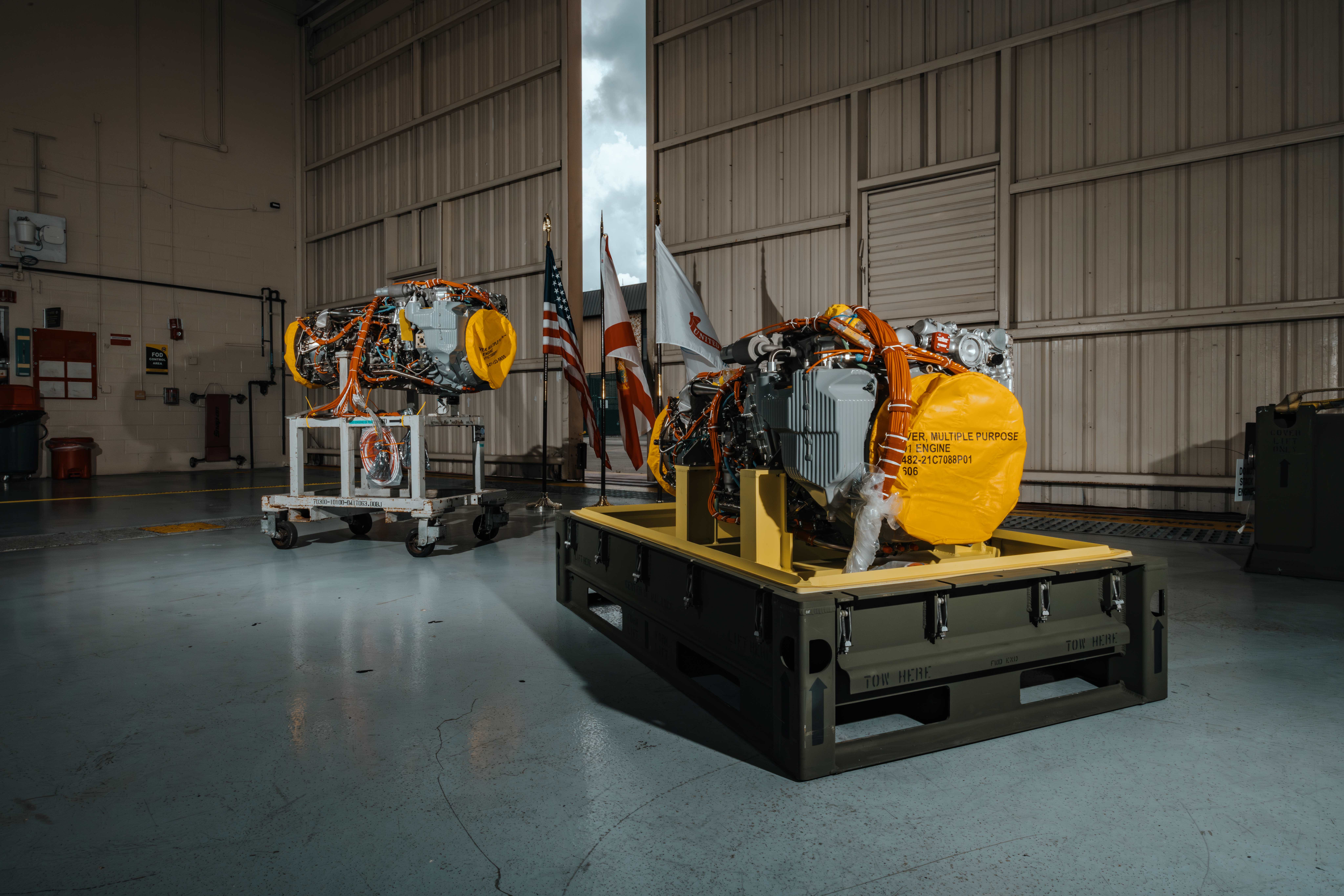 The first two delivered T901 engines sit in a warehouse