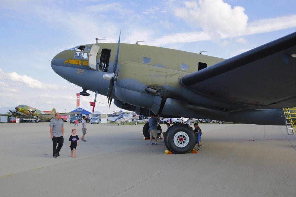 Above: This massive Curtis C-46 “Tinker Belle” transport aircraft is one of the many attractions of this year’s Oshkosh fly-in. Top: Very few planes are off limits at Oshkosh, making the airshow a true aviation geek’s paradise. All images credit: Tomas Kellner/GE Reports