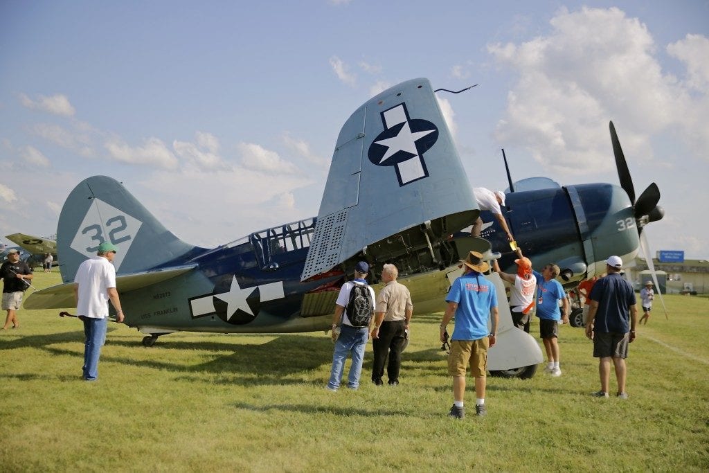 Pilots and collectors from all over the world fly their planes to Oshkosh.